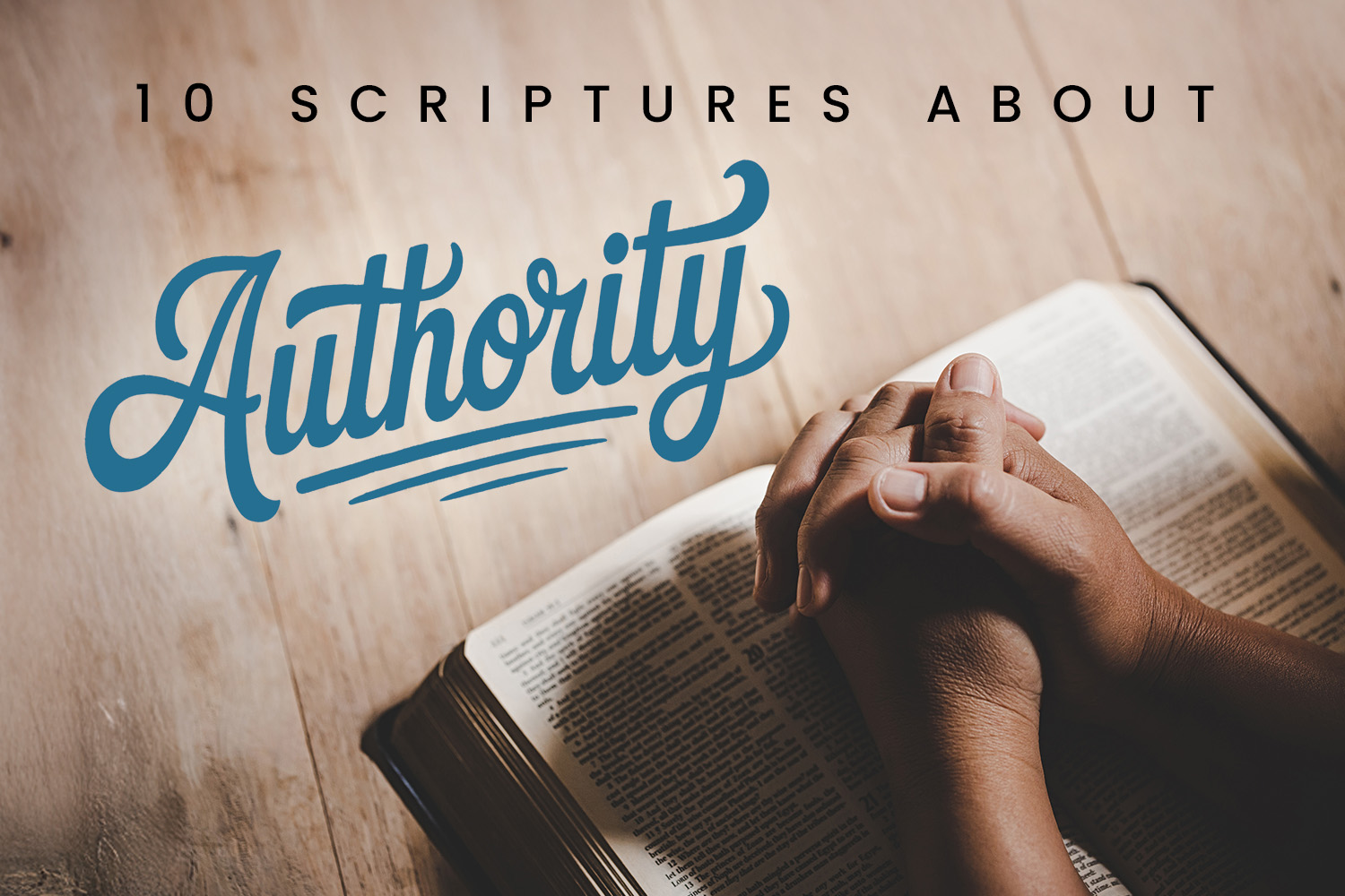 Hands clasped together on top of a Bible, showing prayer